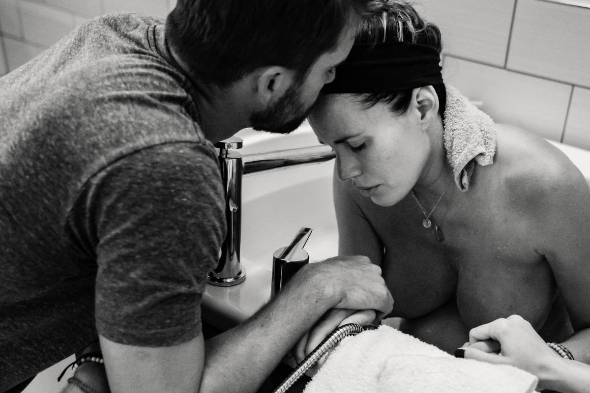 Woman in labour with partner support